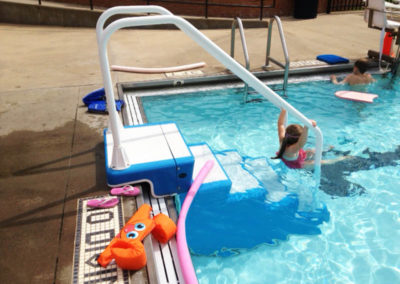 ADA Easy Stair in use in commercial pool